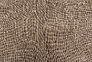 Cloth. The texture of the burlap fabric is close-up. Packaging material. Background Of Burlap Hessian Sacking