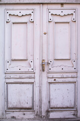Vintage wooden doors , the oldest part of the capital city of Georgia