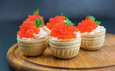 dish basket tartlets stuffed with red caviar