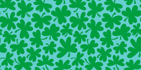 Green shamrock seamless pattern illustration. Natural clover leaf plant background print. St. Patrick's day holiday backdrop texture, irish culture wallpaper design.	