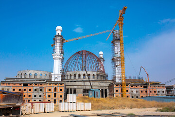 New Muslim Mosque under construction. Finishing work of minarets.