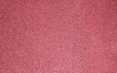 Fototapeta premium Pink glitter background. Festive shiny background. 