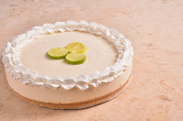 a key lime cheesecake with a slice on the bottom