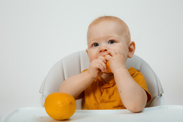 The child eating a delicious, juicy lemon,healthy life.