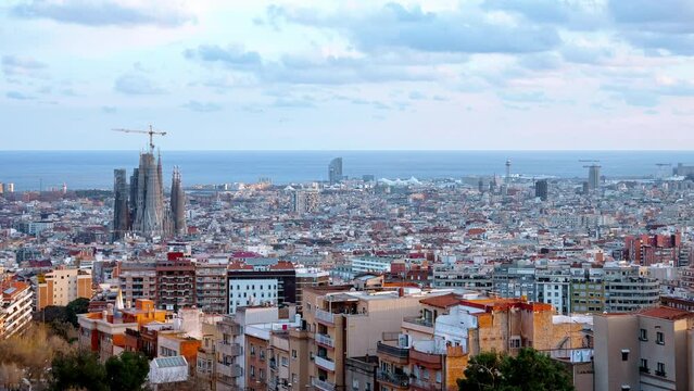 Beautiful aerial timelapse view of the Barcelona city with a Sagrada Familia cathedral standing in the city center. 
