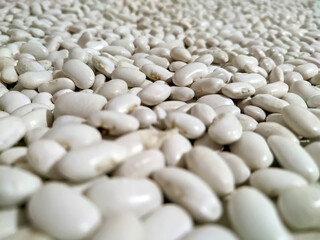 Fototapeta na wymiar view of white beans lying on the table