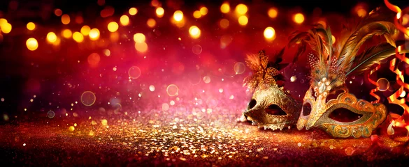 Fototapeten Carnival Party - Venetian Masks On Red Glitter With Shiny Streamers On Abstract Defocused Bokeh Lights © Romolo Tavani