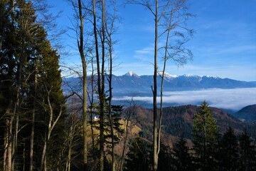 View of mountain Storzic in Gorenjska, Slovenia and the church at Jamnik bellow Jelovica