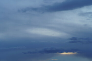 Naklejka na ściany i meble Beautiful sky landscape with dark clouds