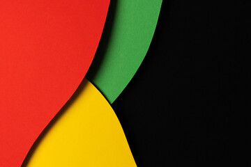 Abstract geometric black, red, yellow, green color background. Black History Month color background with copy space for text