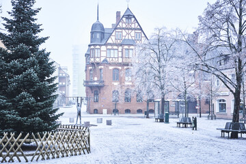 Downtown of Schwedt during winter with snow and trees