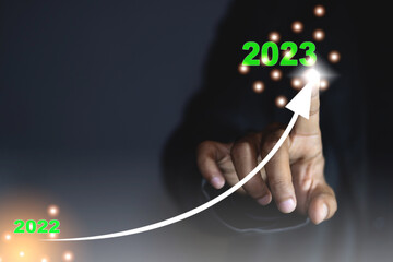 Business growth 2022 to 2023 arrow curved graph in upward direction, profit, investment, sales...