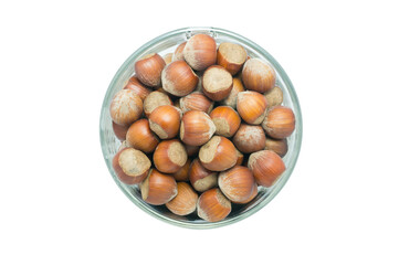 Bowl with hazelnuts on a white background
