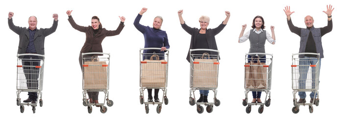 group of people with cart raised their hands up