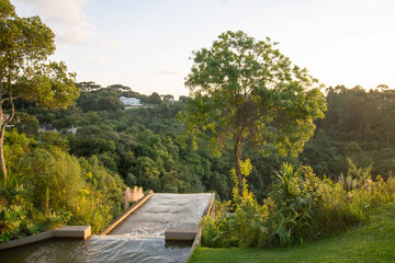 Cascata de água ao por do sol - Parque Tanguá, Curitiba - PR