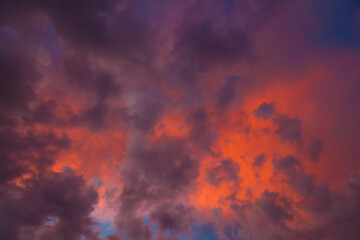 Background of sunset a dark red sky with purple clouds.
