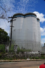 Water reservoir tower in Manaus with 6 tall water silos built side by side. São Jorge district, Manaus, Amazonas state, Brazil.