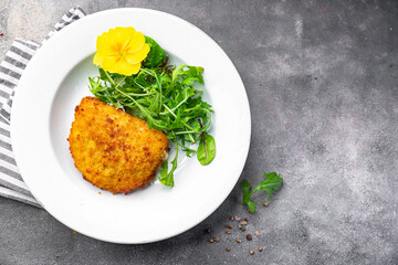 cordon bleu cutlet chicken meat, cheese, bacon meal snack on the table copy space food background rustic top view