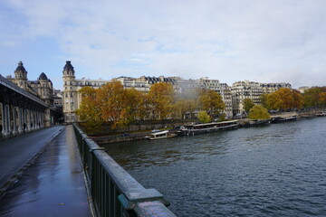 old stone bridge Bir Hakeim over the river Seine in downtown Paris, France in the fall 