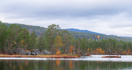 Fototapeta premium Autumn at Damvatn lake near Gransherad, Telemark county, Norway