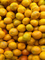 Big lot of fresh organic mandarins