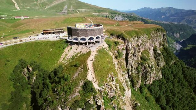 Drone Georgia. Gudauri View Point Mountaintop lookout, Russia-Georgia Friendship Monument. Famous landmark destination near Tbilisi.