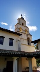 Sun behind bell tower - Santa Barbara Mission, California