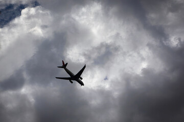 Fototapeta na wymiar airplane flying in the sky