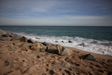 Fototapeta na wymiar Beautiful sea with rocks and sand