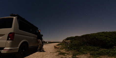 Fototapeta na wymiar Transporter Camping Van bus at the California Ocean in the coastal Nature