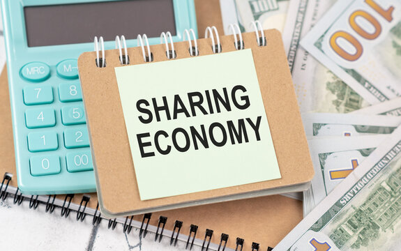 Sharing economy text concept isolated over white background.