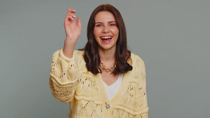 Amused pretty woman pointing finger to camera, laughing out loud, taunting making fun of ridiculous...