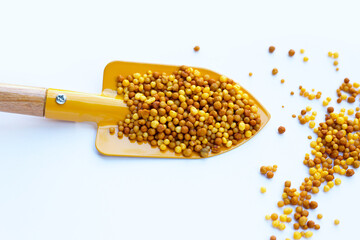 Yellow fertilizer plant food. High NPK