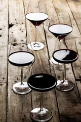 Foto op Plexiglas Glasses with red wine on wooden background, with copy space © vectorfusionart