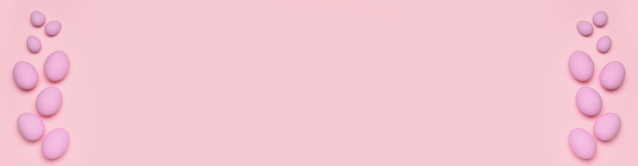 Banner with Easter eggs on pink background with space for text