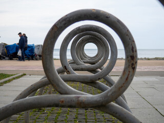 Bicycle parking. infrastructure in the park. Place for bicycles. Empty. Unusual angle.Bicycle parking