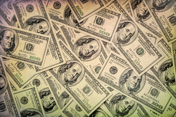 One hundred dollars. Money supply. US dollars banknotes background. Hundred dollar bills. American currency. Concept of money and finance.  Toned image