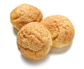 Delicious buns with sesame seeds isolated on white background