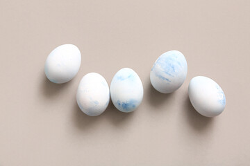 Painted eggs for Easter celebration on grey background