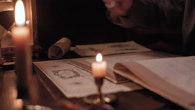18th century ships captain writing in the log book