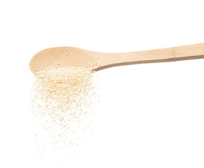 White Sesame pouring down from wooden spoon, white Sesame grain wave floating, fall in air. Basil seed is organic healthy food. White background Isolated high speed shutter, freeze stop motion