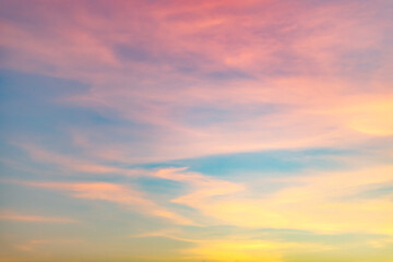 Naklejka na ściany i meble Real amazing sunrise or sunset sky with gentle colorful clouds.