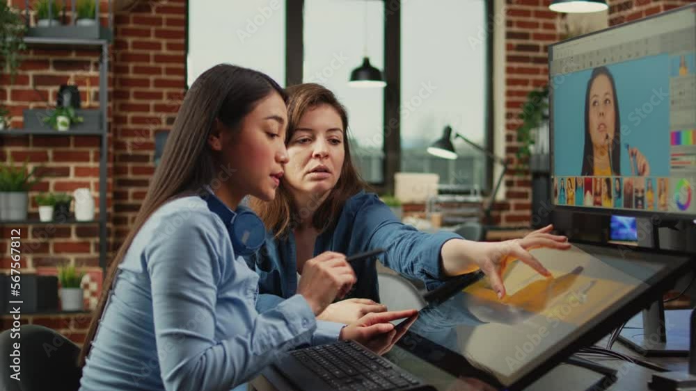 Aufkleber female content creators editing professional images with retouching software and stylus pen, working