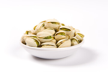 Pistachio nuts isolated on white background. 