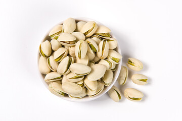 Pistachio nuts isolated on white background. 