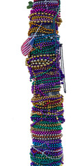 Isolated Mardi Gras beads wrapped around a tree trunk