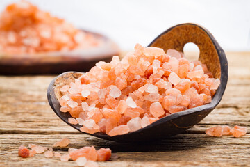 Fototapeta na wymiar Himalayan Pink Salt in Container, Healthy Mineral
