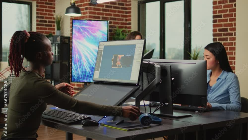 Poster female creative engineer using game programming software on computer and touchscreen, working with g