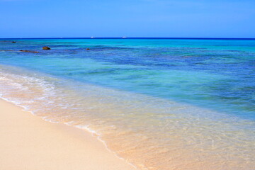 Secluded turquoise beach in Aruba, Caribbean Blue sea, Duth Antilles