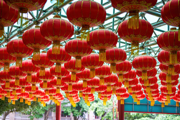 Densely hung festive Chinese red lanterns